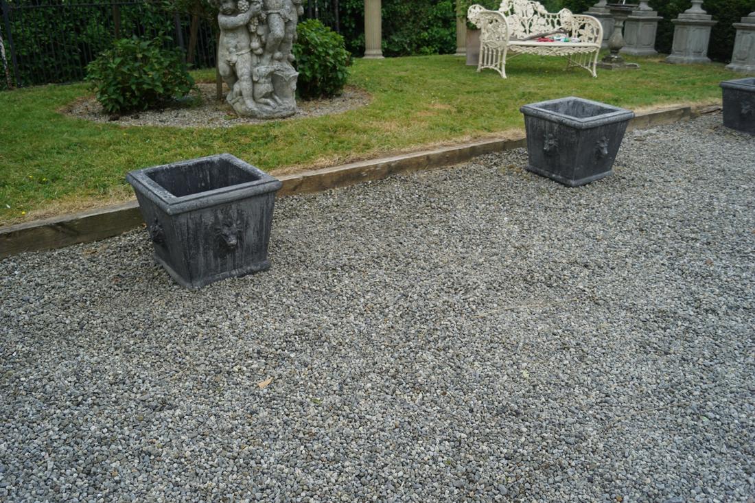 PAIR OF CLASSICAL MOULDED STONE PLANTERS: each of square form. 46 cm. high; 53 cm. wide; 53 cm. deep; Approximate Time: 16:11 Lot No: 747 Category: Garden & Decorative Objects
