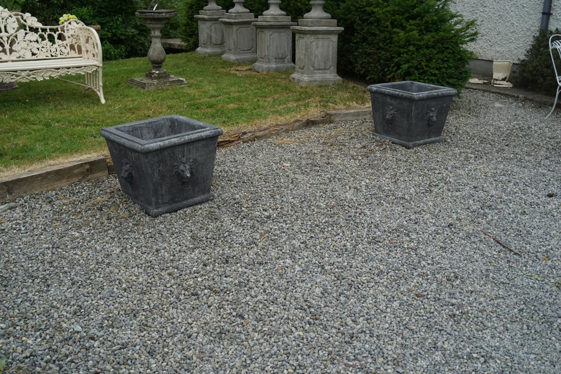 PAIR OF CLASSICAL MOULDED STONE PLANTERS: each of square form. 45 cm. high; 52 cm. wide; 52 cm. deep; Approximate Time: 16:12 Lot No: 748 Category: Garden & Decorative Objects