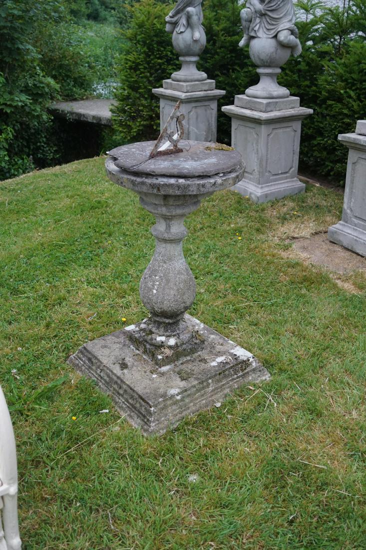SLATE SUNDIAL: raised on a baluster stem and square foot. 84 cm. high; 44 cm. diameter Approximate Time: 16:15 Lot No: 751 Category: Garden & Decorative Objects