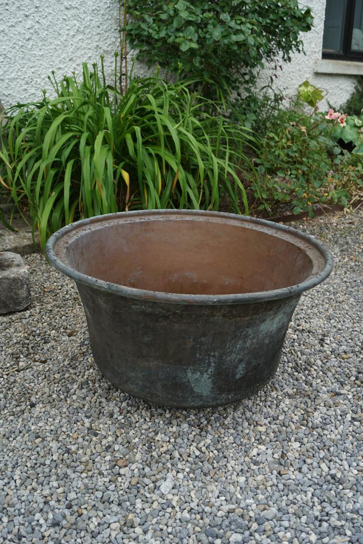 LARGE 19TH-CENTURY COPPER PLANTER: of circular tapering form. 43 cm. high; 71 cm. in diameter; Approximate Time: 16:21 Lot No: 758 Category: Garden & Decorative Objects