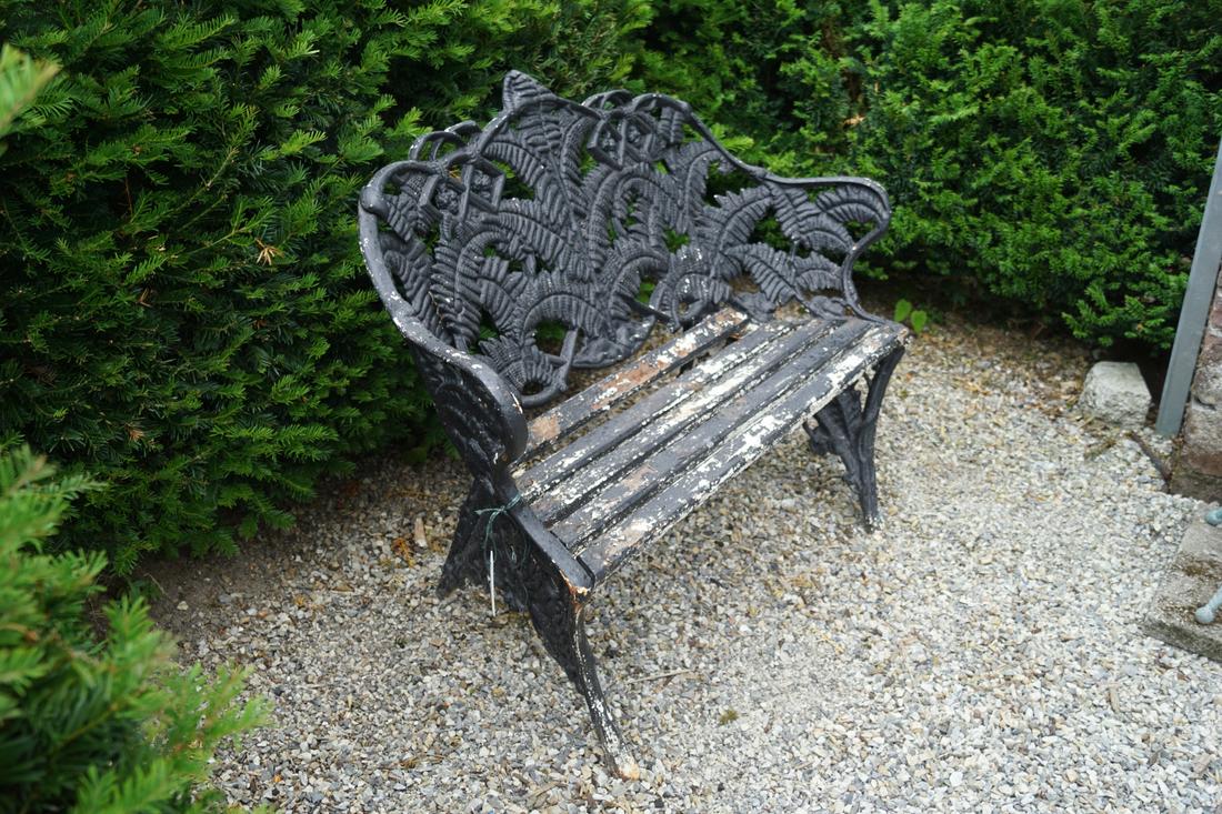 19TH-CENTURY CAST IRON FERN LEAF BENCH: raised on scroll ends. 97 cm. high; 145 cm. wide; 60 cm. deep; Approximate Time: 16:47 Lot No: 787 Category: Garden & Decorative Objects
