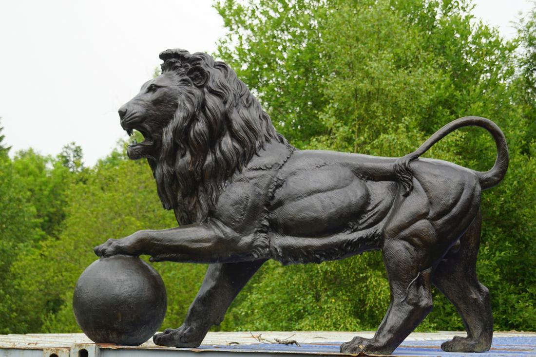 LARGE BRONZE GARDEN SCULPTURE: Figure of a Medici lion, its paw resting on a sphere. 170 cm. high; 240 cm. wide; 65 cm. deep Approximate Time: 16:54 Lot No: 795 Category: Garden & Decorative Objects