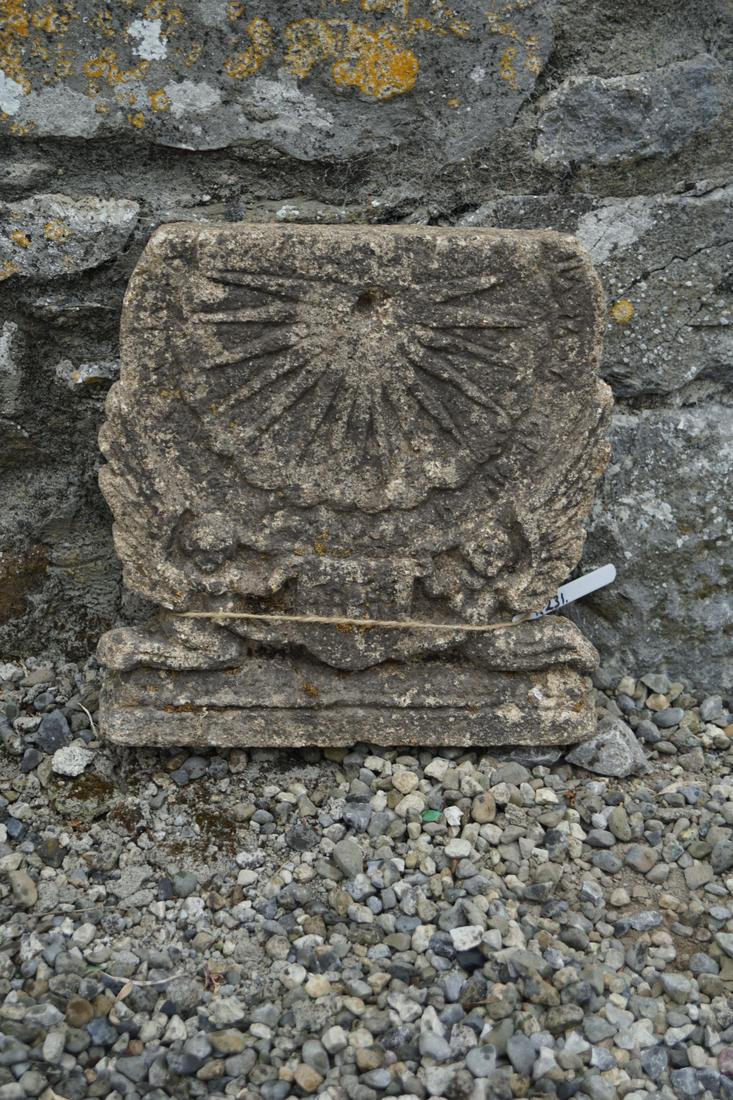MOULDED STONE ARMORIAL SUNDIAL: flanked by putti. 34 cm. high; 34 cm. wide Approximate Time: 16:57 Lot No: 798 Category: Garden & Decorative Objects