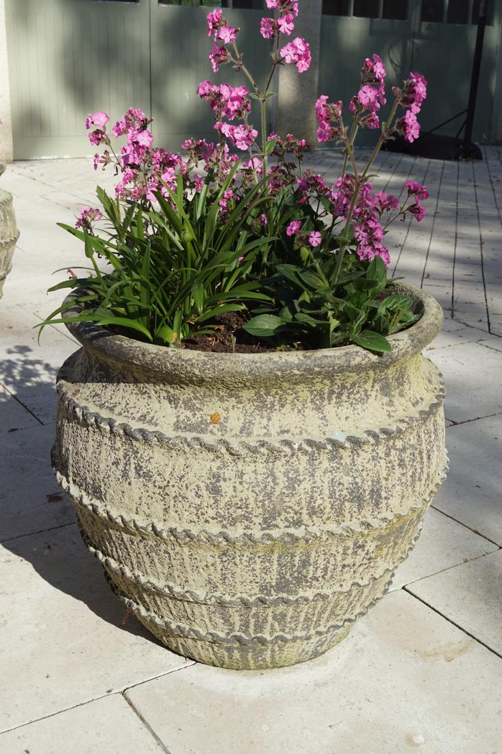 PAIR OF LARGE POTTED TERRACOTTA PLANTERS: of ribbed ovoid form with an everted rim. 65 cm. high; 70 cm. in diameter; Approximate Time: 17:01 Lot No: 803 Category: Garden & Decorative Objects