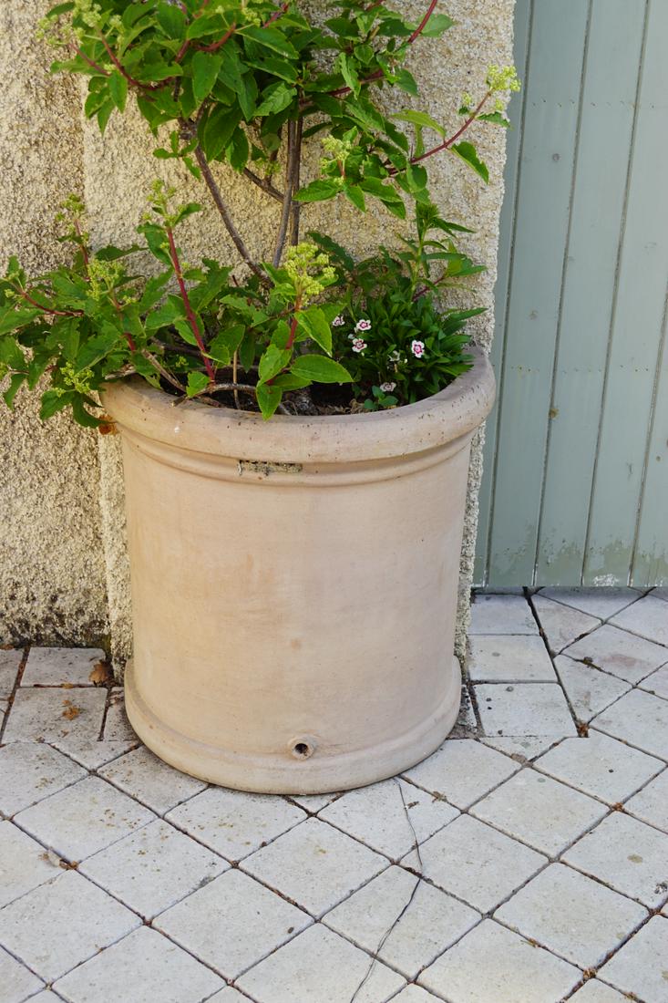 PAIR OF TERRACOTTA FLOWER POTS: each of cylindrical form, with a moulded rim. 60 cm. high; 58 cm. wide; 33 cm. deep; Approximate Time: 17:10 Lot No: 813 Category: Garden & Decorative Objects