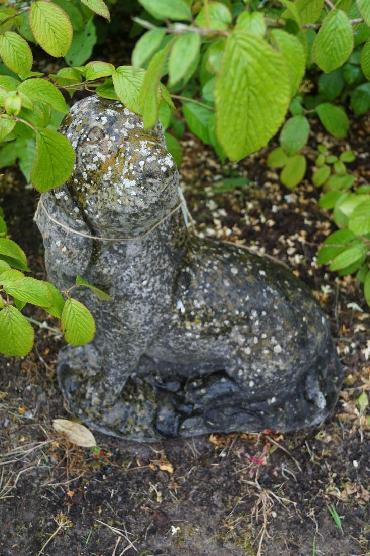 MOULDED STONE GARDEN SCULPTURE: Figure of a Dachshund seated. 45 cm. high; 40 cm. wide; Approximate Time: 17:35 Lot No: 840 Category: Garden & Decorative Objects