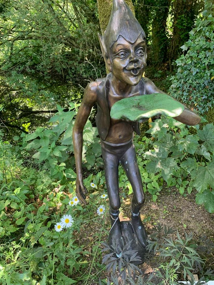 BRONZE GARDEN FIGURAL FOUNTAIN: shown as a pixie blowing on a water lily. 130 cm. high; 45 cm. wide Approximate Time: 17:46 Lot No: 873 Category: Garden & Decorative Objects