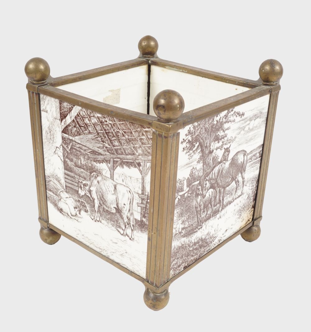 19TH-CENTURY MINTON CERAMIC & BRASS JARDINIERE: of square form with painted decorated panels depicting horses, cattle, and deer. 20 cm. high; 18 cm. square Approximate Time: 10:39 Lot No: 55