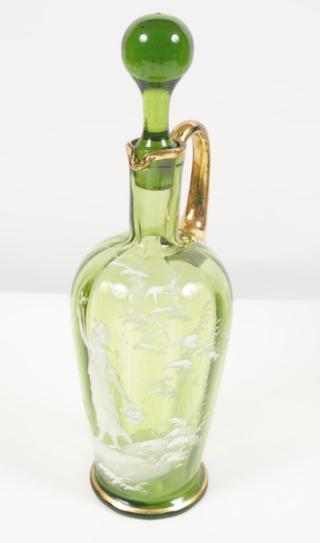 MARY GREGORY GREEN GLASS DECANTER: and stopper, with gilded handle. 22 cm. high; Approximate Time: 10:48 Lot No: 567