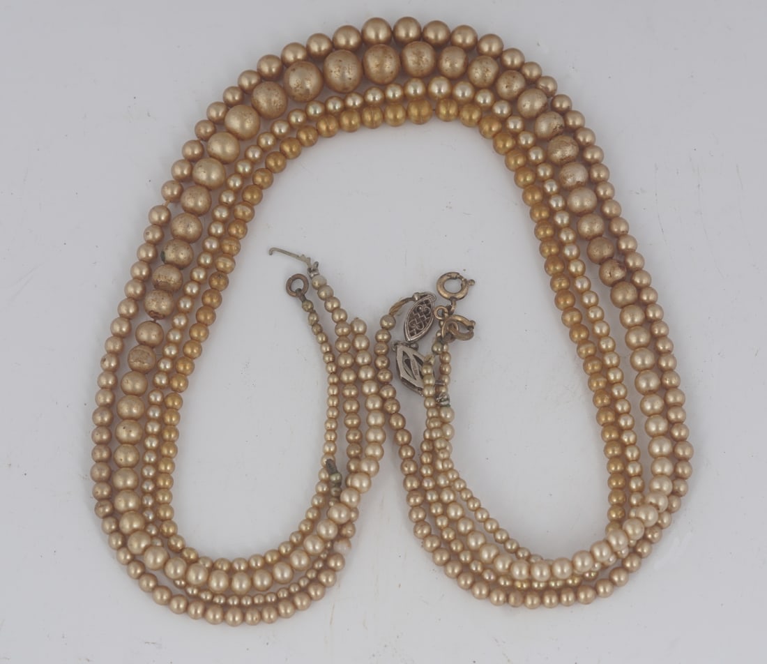 4 FAUX PEARL NECKLACES: one with sterling silver clasp. Provenance: The Dr. Kevin Moynihan Collection, Macroom, Co. Cork. Approximate Time: 17:24 Lot Number: 1030
