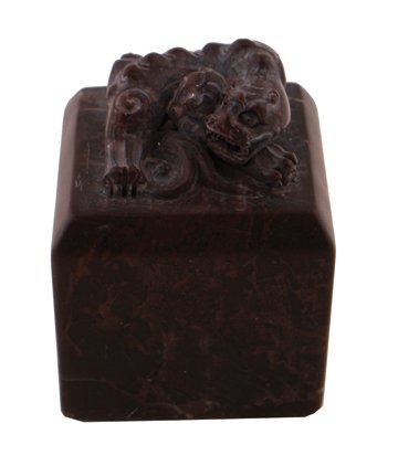 Chinese soapstone fo dog: Chinese soapstone fo dog, mounted on a plinth 6 cm. high