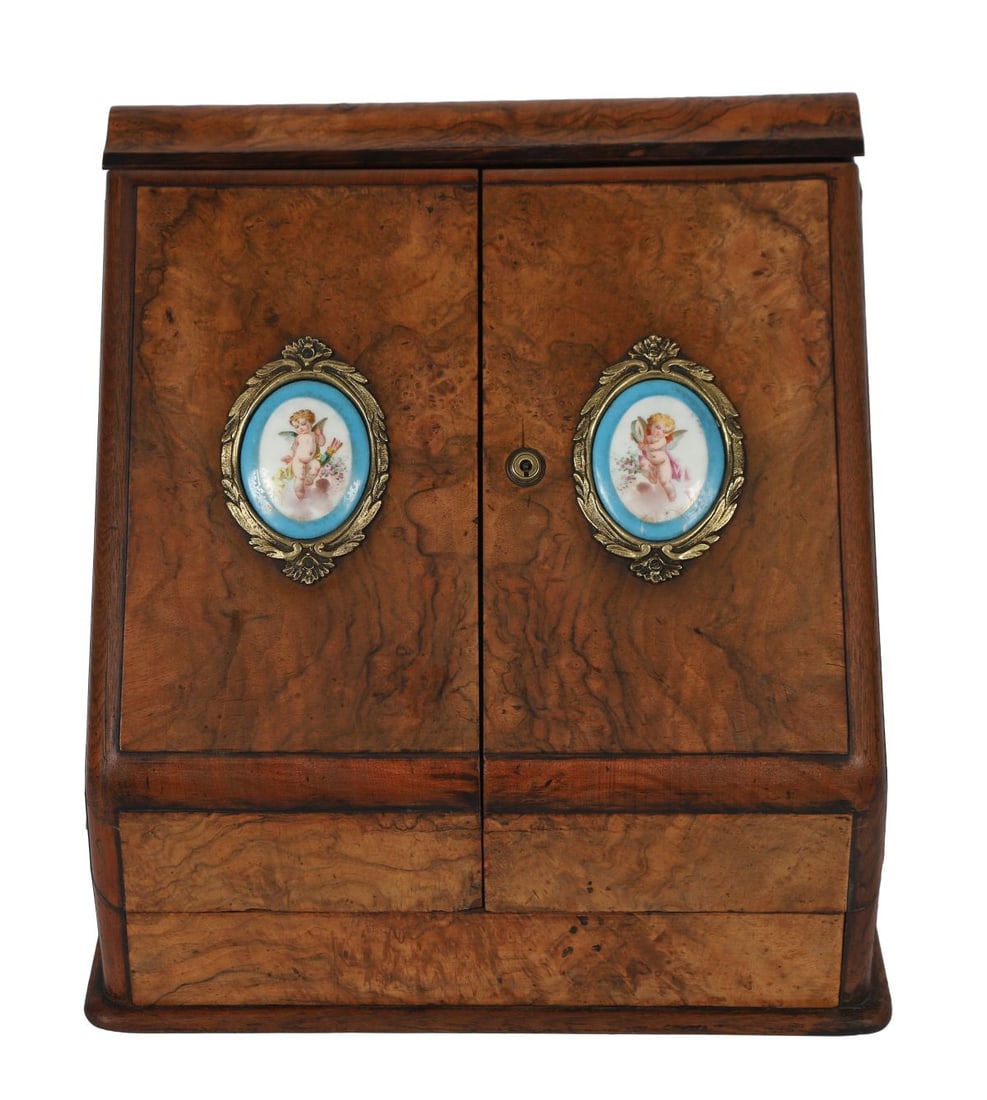 19TH-CENTURY WALNUT STATIONERY BOX: ORMOLU-MOUNTED, A 19th-century walnut stationery box of rectangular form, mounted with ormolu corner mounts and escutcheon, the hinged lid enclosing a fitted interior (not examined). ANTIQUE BOXES