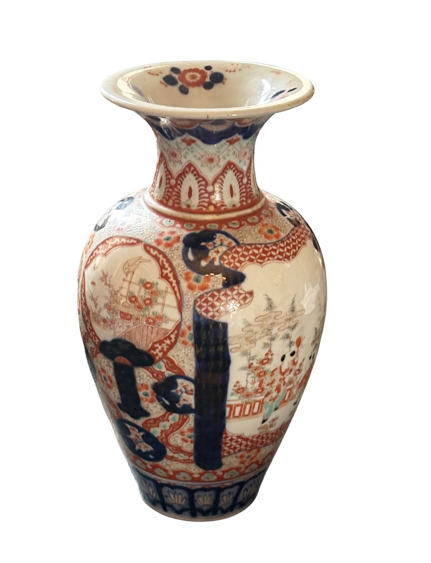 A 19TH CENTURY JAPANESE IMARI FIGURAL VASE: A 19th-century Japanese Imari vase of baluster form, decorated with figural panels within shaped reserves, surrounded by dense floral and geometric ornament. JAPANESE