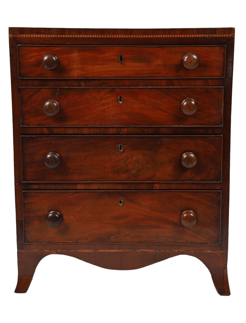 19TH-CENTURY IRISH MAHOGANY CHEST OF DRAWERS: MAHOGANY AND SATINWOOD-INLAID, The rectangular top with crossbanded and line inlaid decoration above four long graduated drawers, fitted with turned wooden knob handles and escutcheons, raised on