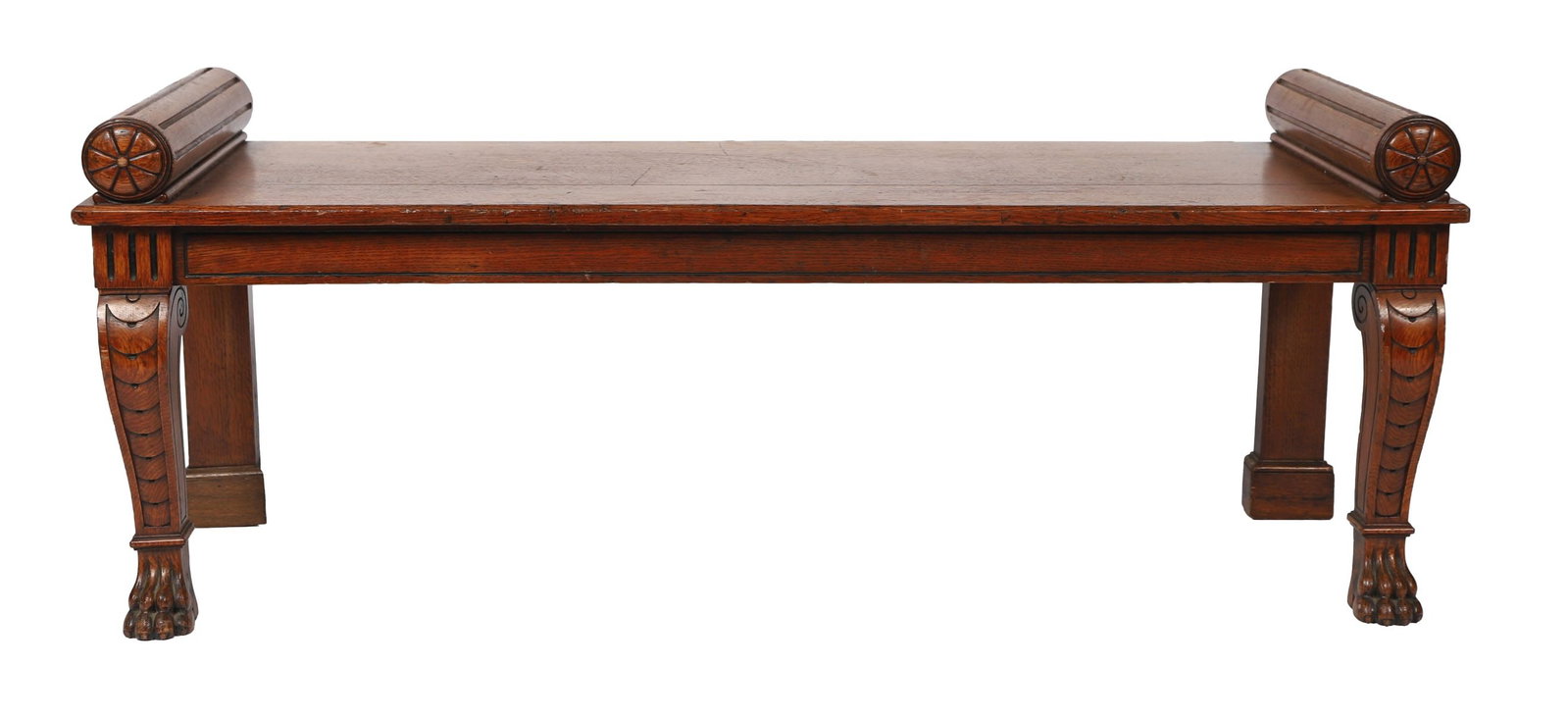 EARLY 19TH-CENTURY IRISH OAK HALL SEAT: The rectangular panelled seat with scroll endsabove a conforming frieze, raised on shapedsupports with scroll legs to the fore, terminating incarved claw feet. FURNITURE