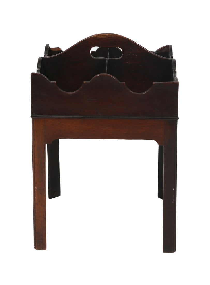 GEORGE III MAHOGANY CHIPPENDALE BOTTLE STAND: of four crenallated bottle sections, raised on square chamfered legs. FURNITURE