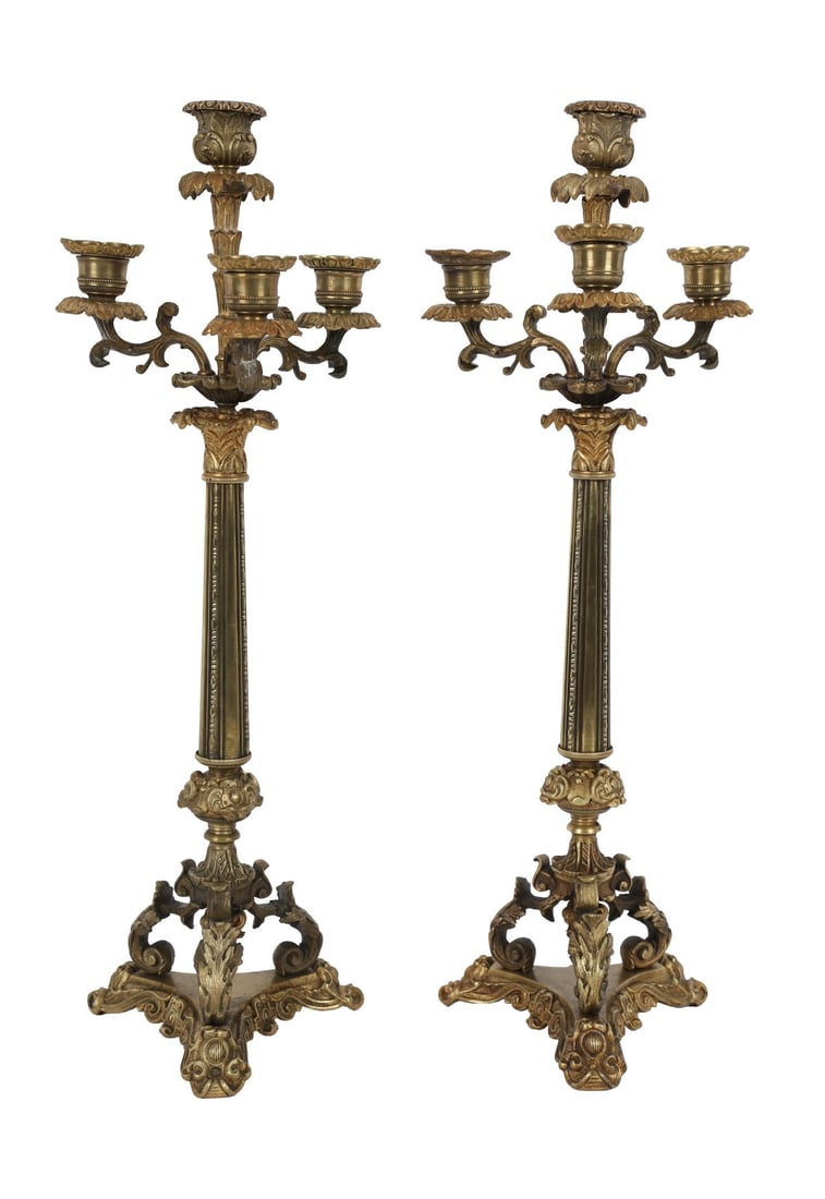 PAIR 19TH-CENTURY GILT-BRONZE CANDELABRA: Pair of ornate gilt-bronze candelabra, each with a central column issuing multiple scrolling branches with foliate mounts and shaped drip pans, raised on triform bases with cast ornament. Richly cast 