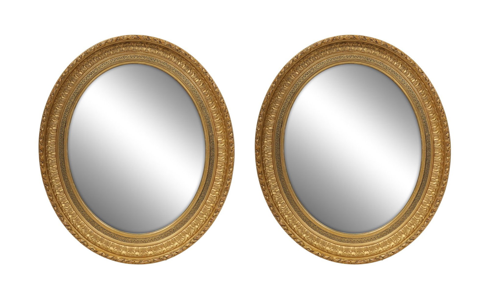 PAIR OF CONTINENTAL GILTWOOD OVAL WALL MIRRORS: 19TH-CENTURY. The frames richly carved with repeating leaf and bead ornament. MIRRORS