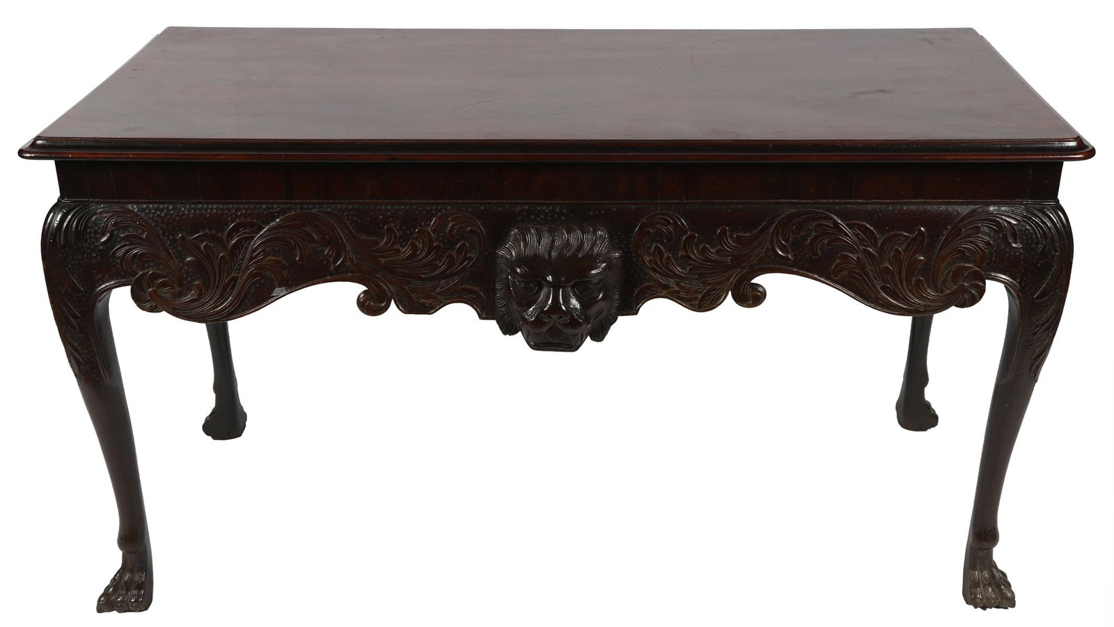 18TH - CENTURY IRISH MAHOGANY SIDE TABLE: The rectangular top with moulded edge above a conforming frieze, centred by a carved mask to a shaped apron, raised on acanthus leaf-carved cabriole legs terminating in tall feet. FURNITURE