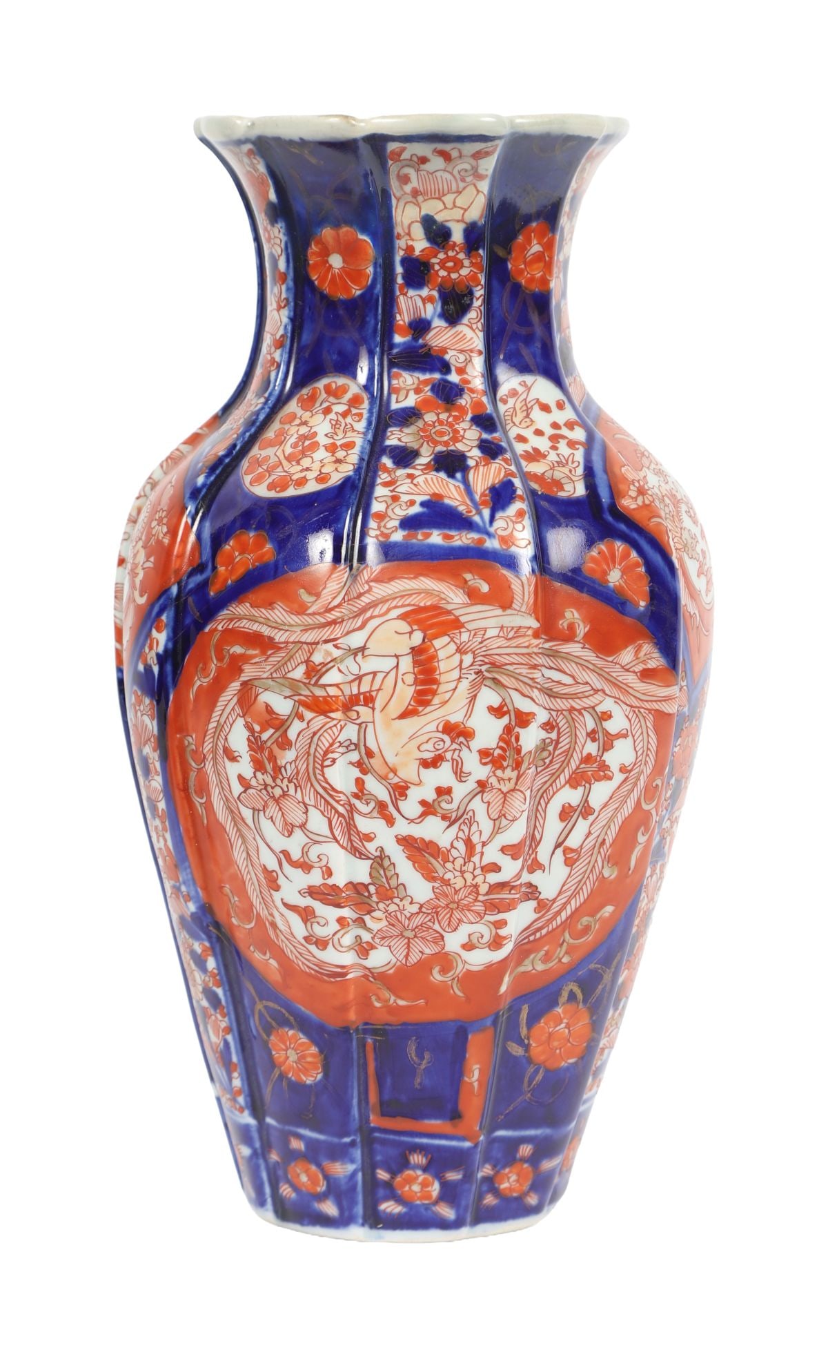A 19TH CENTURY JAPANESE IMARI FACETTED VASE: A 19th-century Japanese Imari vase of facetted baluster form, decorated with panels of birds, flowers and foliate ornament within geometric borders. JAPANESE