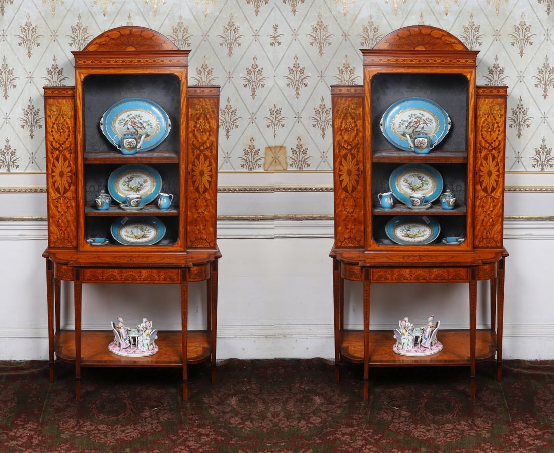 PR OF GEORGE III SATINWOOD & MARQUETRY CABINETS: ON STANDS. ATTRIBUTED TO INCE & MAYHEW, LONDON. CIRCA 1780.A rare and highly decorative pair of George III satinwood cabinets on stands, each surmounted by a crescent arched pediment centred by a radi