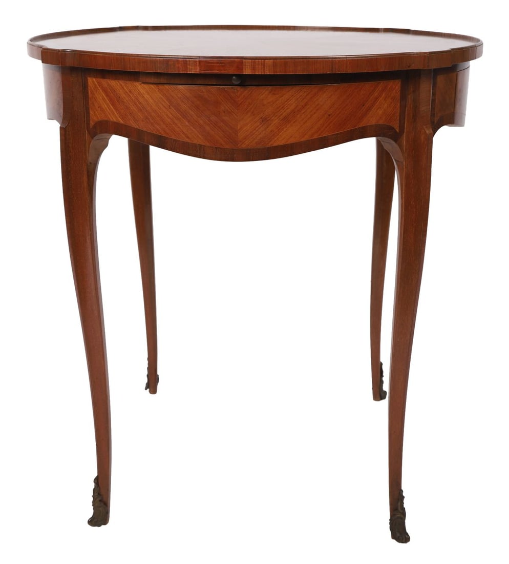 FRENCH MAHOGANY & SATINWOOD-INLAID CENTRE TABLE: EARLY 20TH - CENTURY, The shaped circular top with radiating veneer panels above a serpentine frieze fitted with a drawer, raised on tapering legs terminating in sabots. FURNITURE