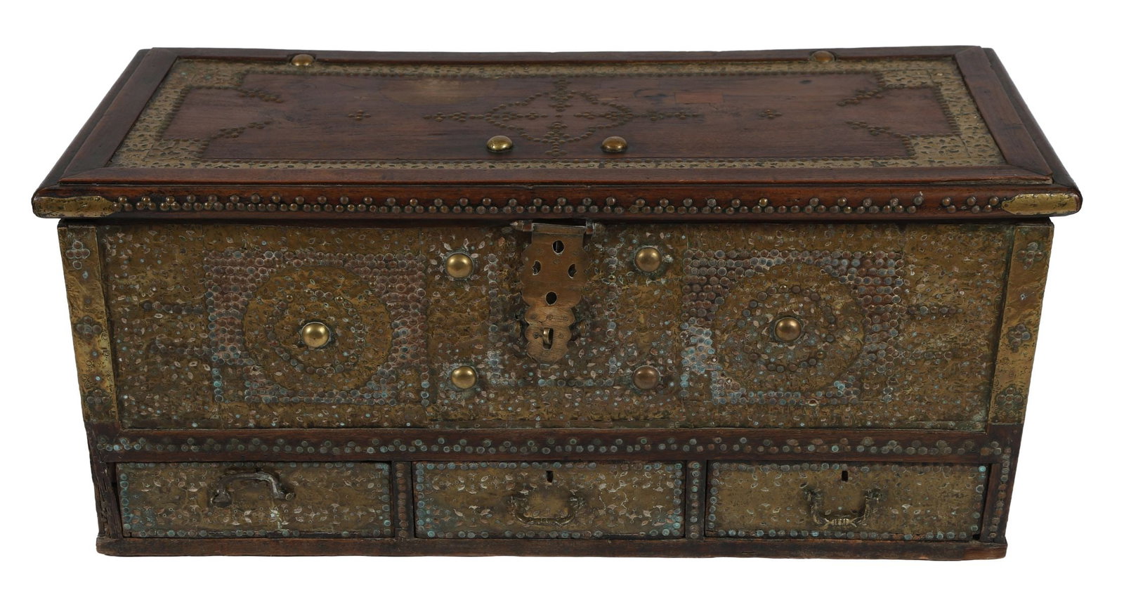 19TH-CENTURY ZANZIBAR HARDWOOD TRUNK: BRASS-MOUNTED, A 19th-century Zanzibar hardwood trunk of rectangular form, profusely studded and mounted with brass bosses, straps and escutcheon. FURNITURE