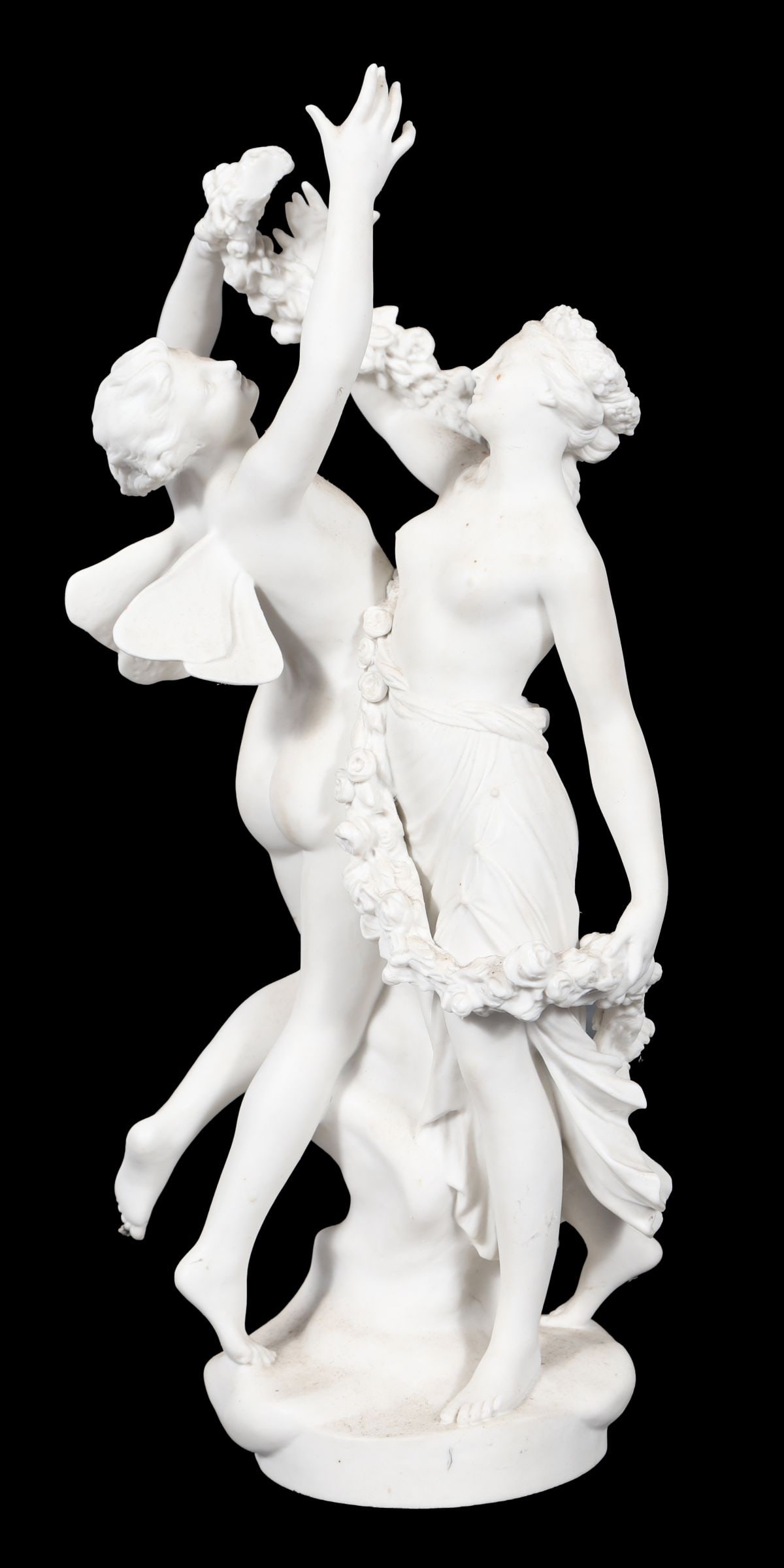 19TH-CENTURY SEVRES PARIAN GROUP: A 19th-century Sèvres-type Parian group modelled as a classical maiden attended by a putto, the figures in flowing drapery and raised on a naturalistic base. PORCELAIN