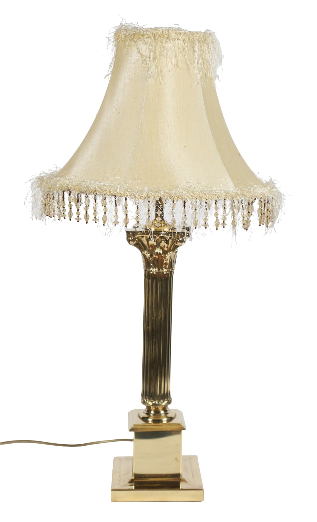 BRASS FLUTED COLUMN TABLE LAMP: WITH CORINTHIAN CAPITAL, Raised on a stepped base, complete with shade. LIGHTING