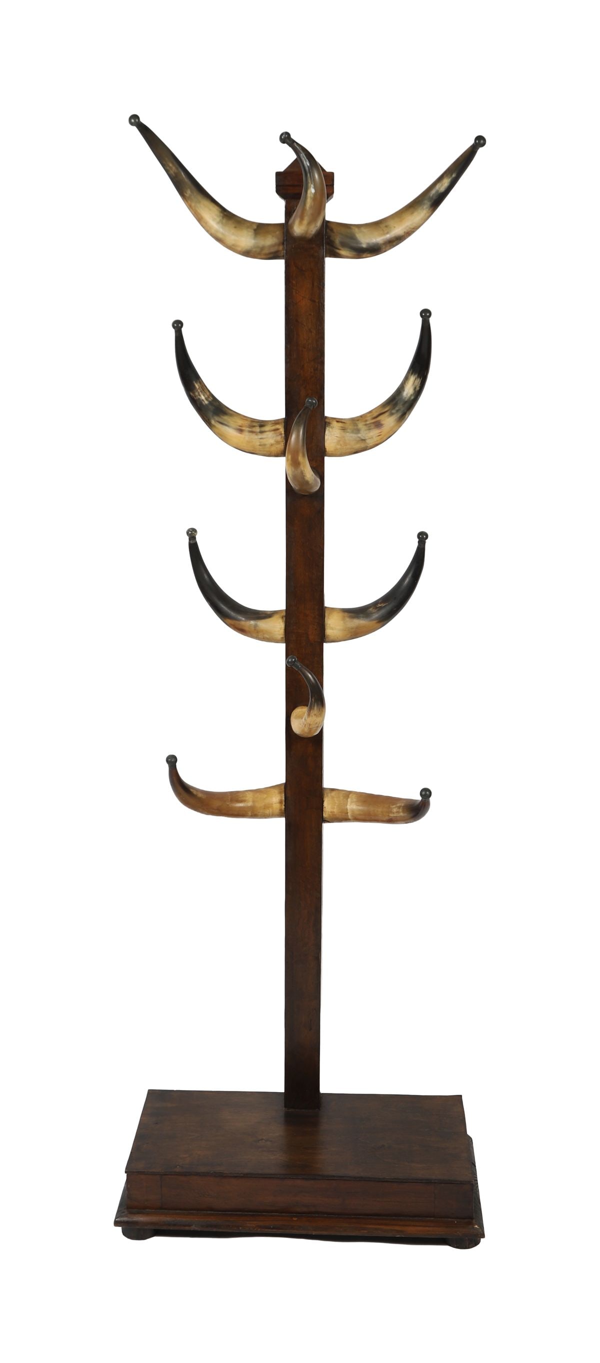 19TH-CENTURY HALL STAND WITH HORN HANGERS: A hall stand with central upright fitted with multiple horn hooks, raised on a rectangular base. FURNITURE