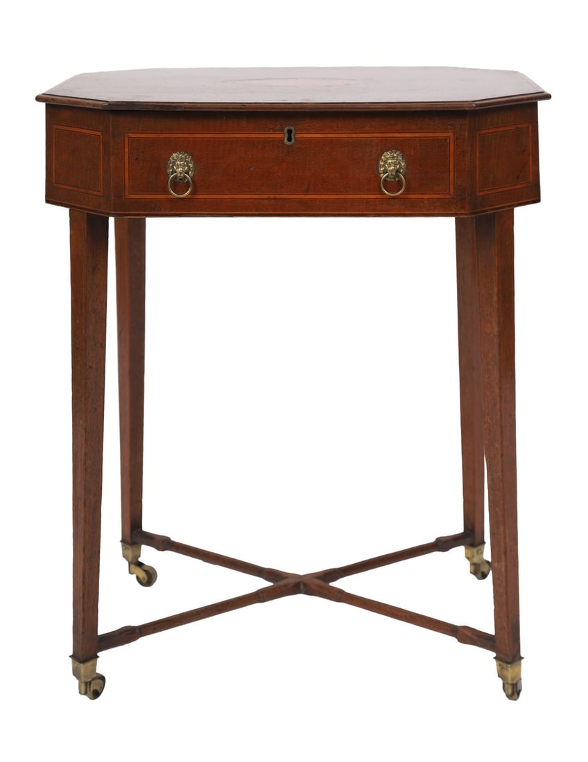 MAHOGANY & SATINWOOD-INLAID OCTAGONAL WORKTABLE: IRISH, LATE 18TH / EARLY 19TH - CENTURY. The octagonal top centred with a satinwood oval reserve within crossbanded and line inlaid borders, the hinged lid opening to a fitted interior, above a frieze