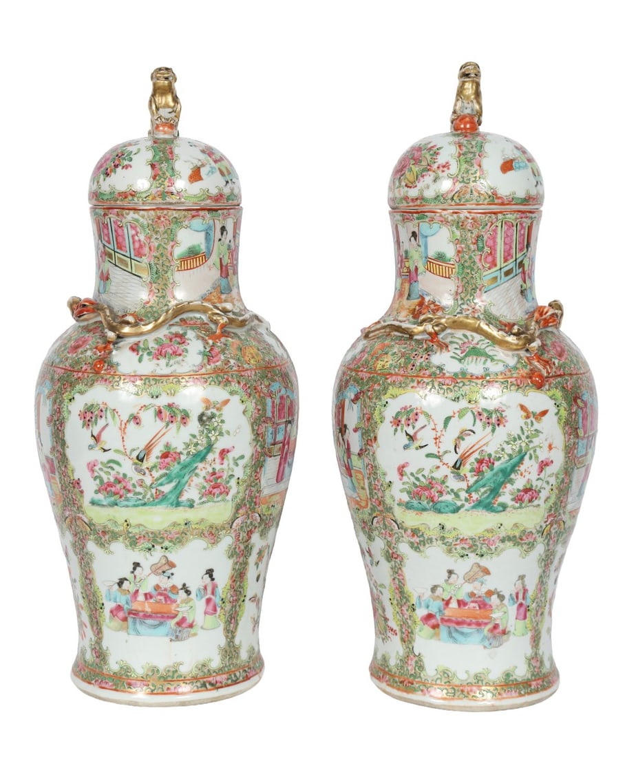 19TH-CENTURY CHINESE FAMILLE ROSE PORCELAIN VASES: AND COVERS, Each decorated with figures in interior and garden scenes within foliate borders, with domed covers and finials. PORCELAIN