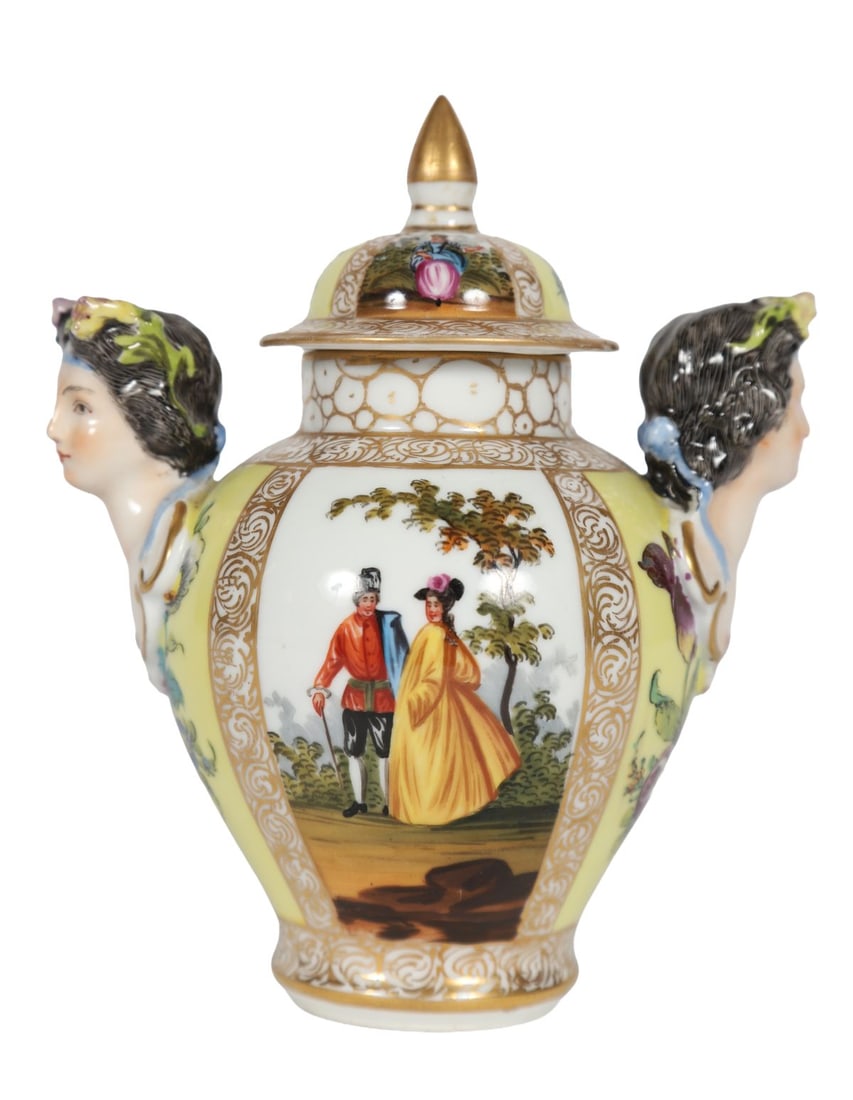 19TH-CENTURY DRESDEN PORCELAIN VASE: Of baluster form with twin figural mask handles, finely painted with reserves of figures in landscape settings, heightened with gilt ornament. PORCELAIN