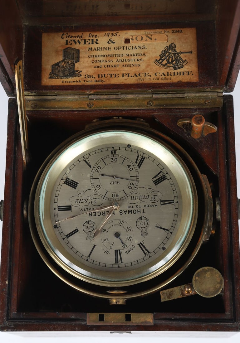 MAHOGANY AND BRASS-BOUND MARINE CHRONOMETER: BY THOMAS MERCER, LONDON, NO. 8312. A marine chronometer by Thomas Mercer, London, No. 8312, contained within a brass-bound mahogany case, the silvered dial with Roman numerals and subsidiary dials, m