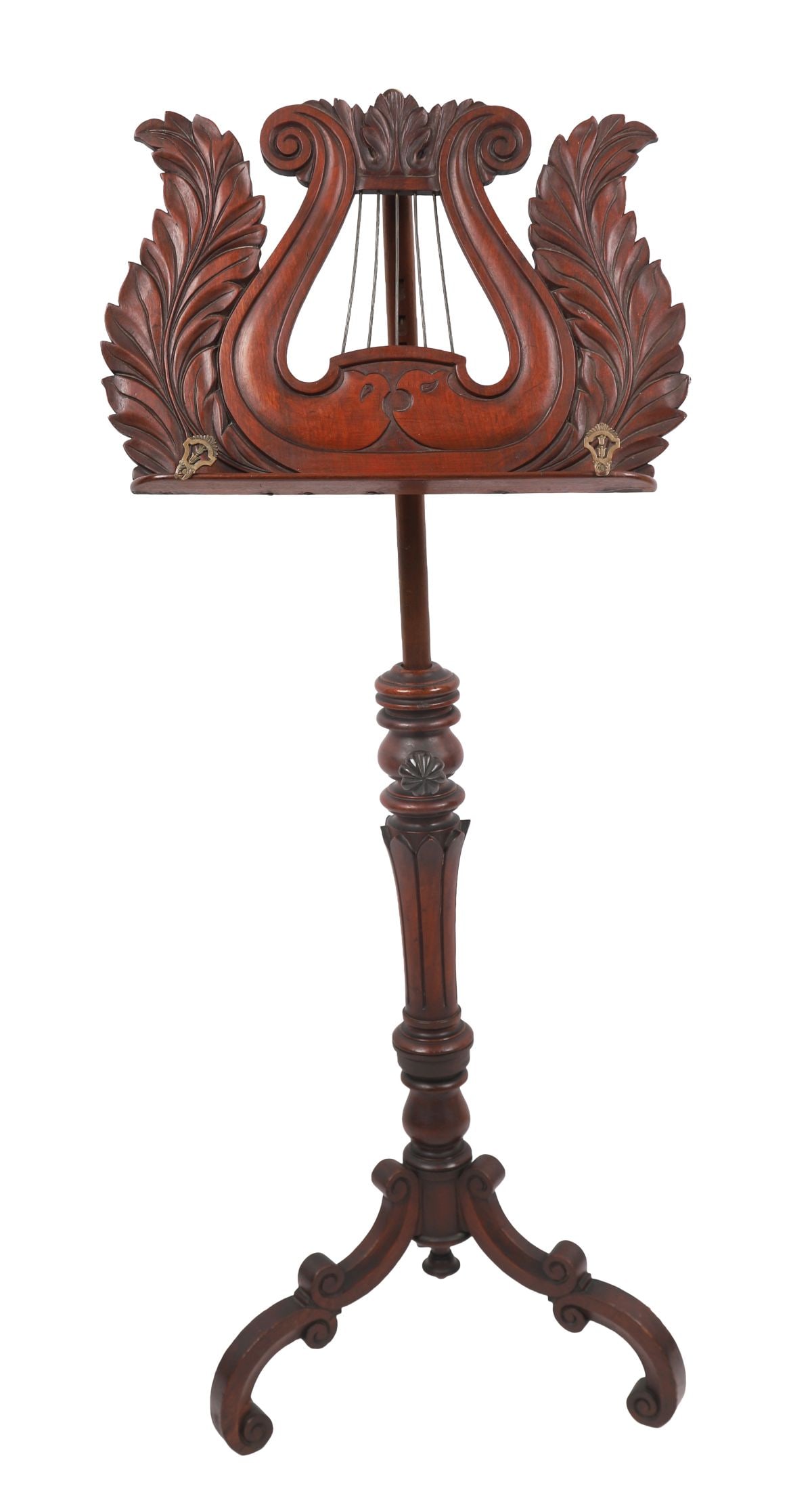 EARLY 19TH-CENTURY MAHOGANY MUSIC STAND: An early 19th-century mahogany adjustable music stand, the lyre-shaped rest carved with scrolling acanthus and raised on a turned and tripod base. FURNITURE