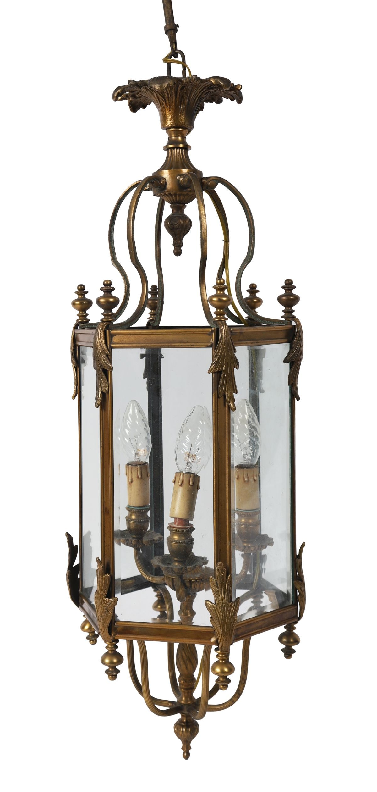 PAIR OF 19TH-CENTURY ORMOLU HALL LANTERNS: A pair of ormolu hall lanterns of rectangular form, each with glazed panels within a foliate-cast framework, fitted with internal light fittings and suspended by scrolling supports and canopy above.