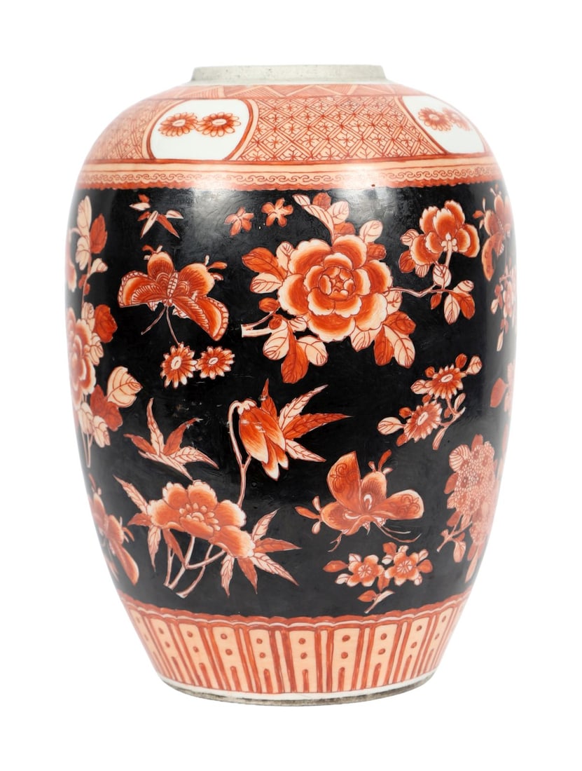 A 19TH CENTURY JAPANESE KUTANI VASE: A 19th-century Japanese Kutani vase, of ovoid form, decorated in iron-red, green, and black enamels with figures in landscape reserves within geometric borders. JAPANESE