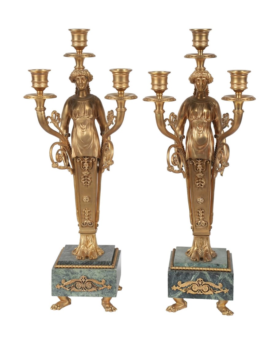 PAIR EMPIRE STYLE ORMOLU CANDELABRA: ORMOLU & VERDIGRIS MARBLE, A pair of Empire-style ormolu candelabra, each modelled as a classical female figure supporting scrolling arms with multiple candle nozzles, raised on square verdigris marbl