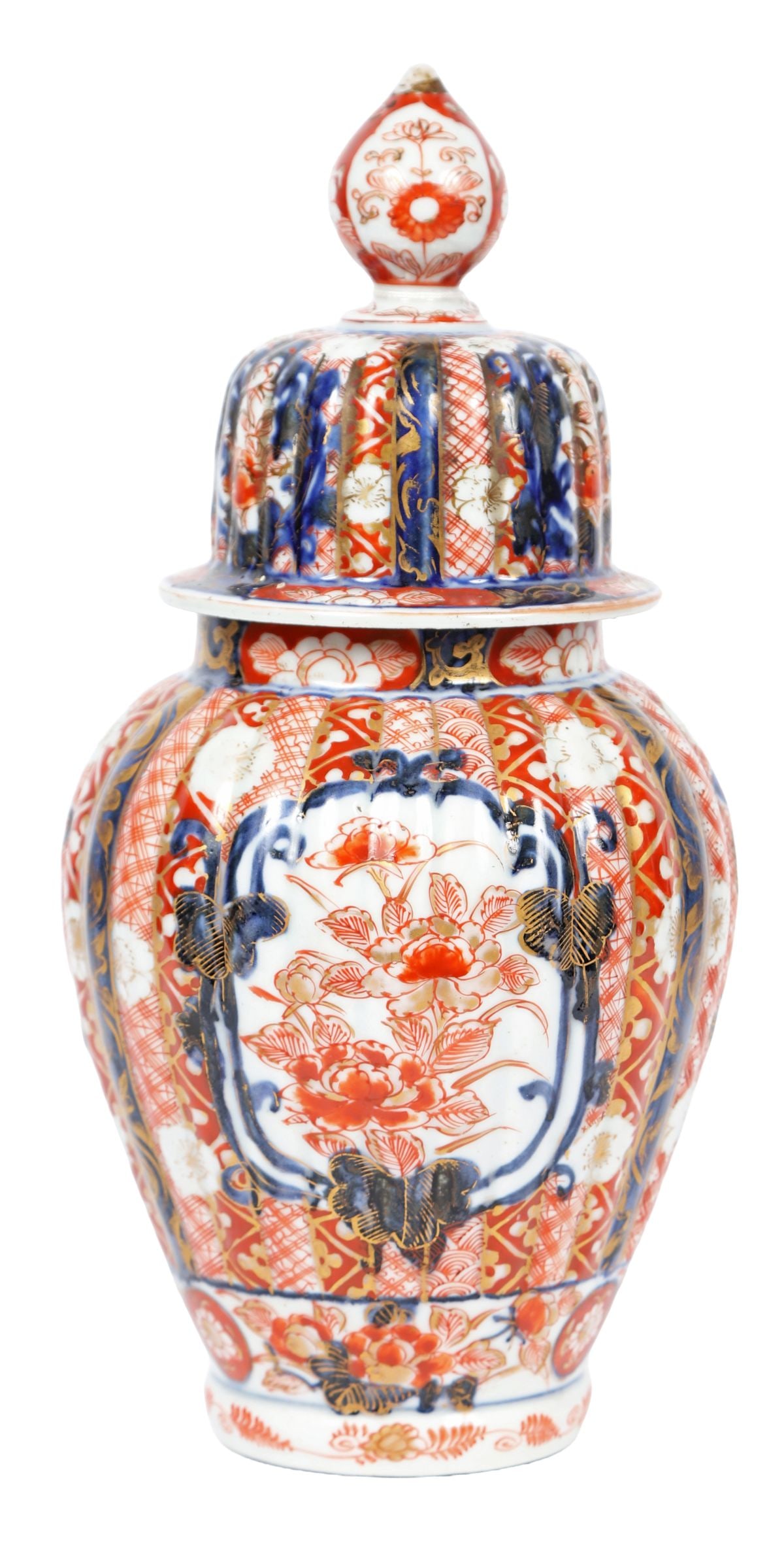 A 19TH CENTURY JAPANESE IMARI LIDDED LOBED URN: A 19th-century Japanese Imari urn and cover, of lobed form with domed lid, decorated throughout with alternating panels of floral ornament and geometric patterns. JAPANESE