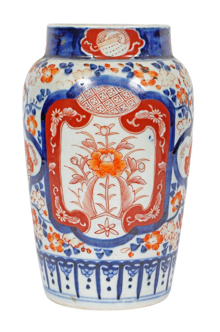 A 19TH CENTURY JAPANESE IMARI VASE: A 19th-century Japanese Imari vase, of baluster form, decorated with scrolling foliage and floral panels in iron-red and cobalt blue. JAPANESE