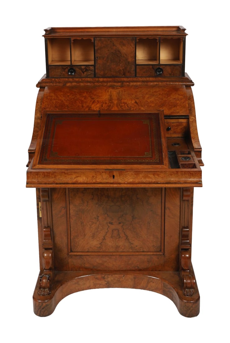VICTORIAN WALNUT POP-UP DAVENPORT DESK: The rectangular top above a spring-operated rising upper section enclosing compartments, the lower section fitted with drawers, raised on a shaped plinth base. FURNITURE
