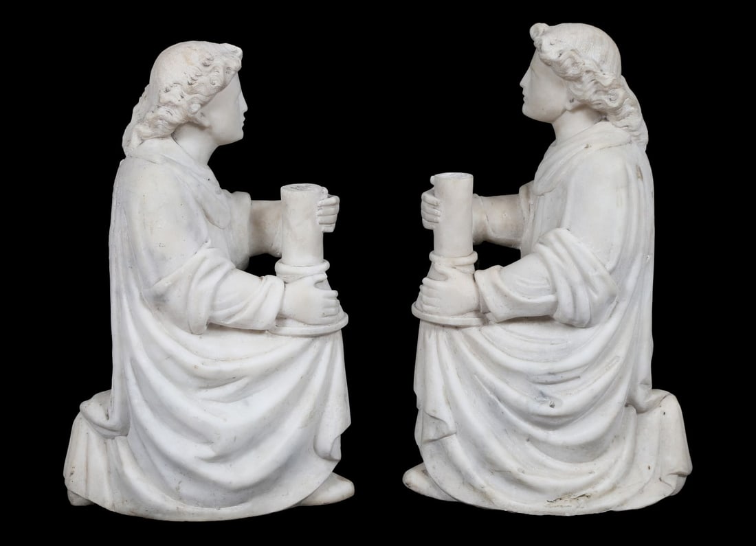 PAIR OF 19TH-CENTURY CARVED MARBLE FIGURES: Modelled as youthful attendants holding vessels, draped in classical robes, carved in the round and raised on integral bases, likely decorative or allegorical in intent. SCULPTURE