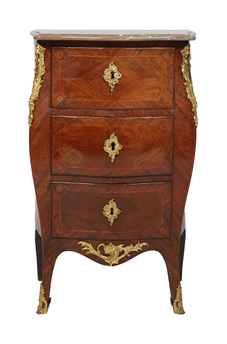 18TH - CENTURY FRENCH KINGWOOD CHEST: ORMOLU-MOUNTED, Of serpentine form, veneered in kingwood with crossbanding and fitted with drawers, mounted with gilt-metal handles and escutcheons, raised on shaped supports. FURNITURE