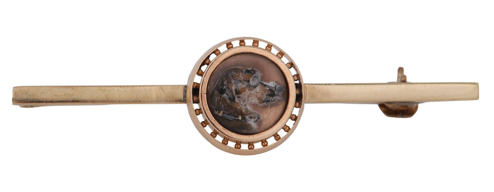 ESSEX CRYSTAL BROOCH: A reverse-painted Essex crystal brooch depicting a sporting subject. JEWELLERY