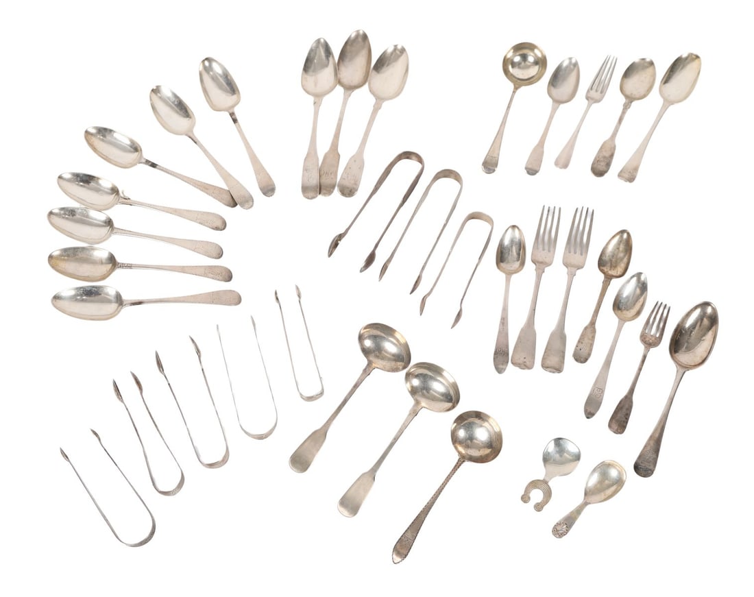 COLLECTION OF GEORGIAN SILVER FLATWARE: AND LATER IRISH AND ENGLISH SILVER FLATWARE. A mixed collection of predominantly late 18th and early 19th-century silver flatware, comprising a set of seven Dublin dessert spoons (c.1775), four tables