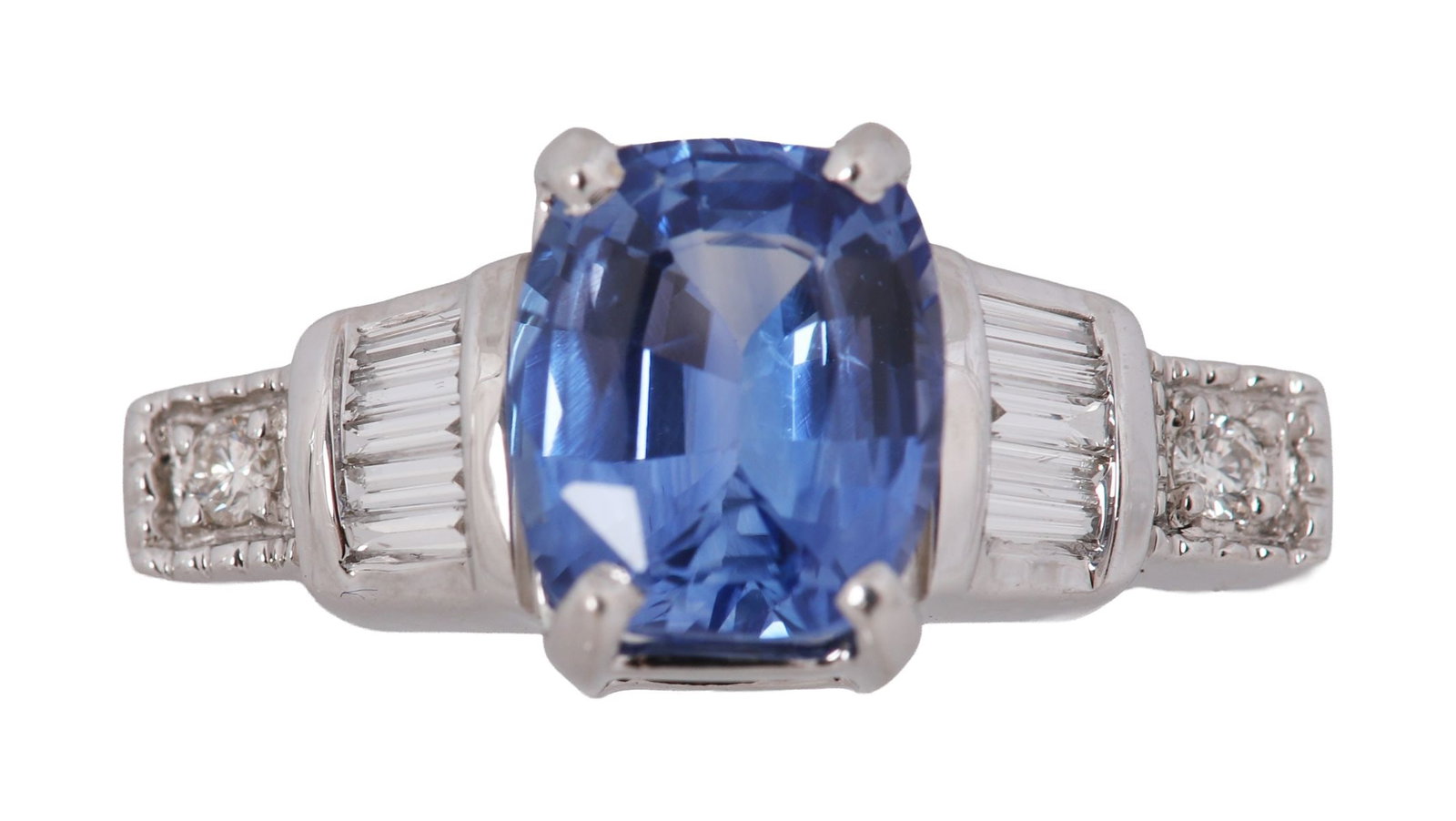 18K WHITE GOLD SAPPHIRE AND DIAMOND RING: A sapphire and diamond ring in 18-carat white gold. JEWELLERY