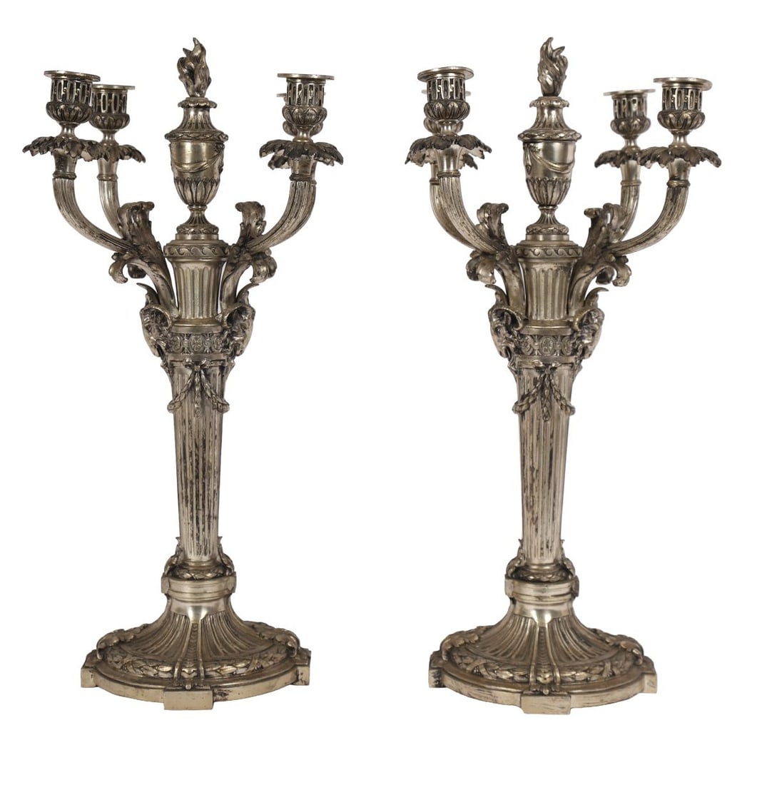 PR 19TH-CENTURY SILVER-PLATED 5-LIGHT CANDELABRA: Continental, Of neoclassical design, each with a fluted column surmounted by a central urn issuing four scrolling branches and central light, the stem applied with masks and foliate ornament, raised o