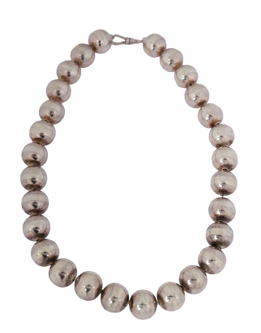 LARGE SILVER BEADS NECKLACE: A necklace composed of large silver beads. JEWELLERY