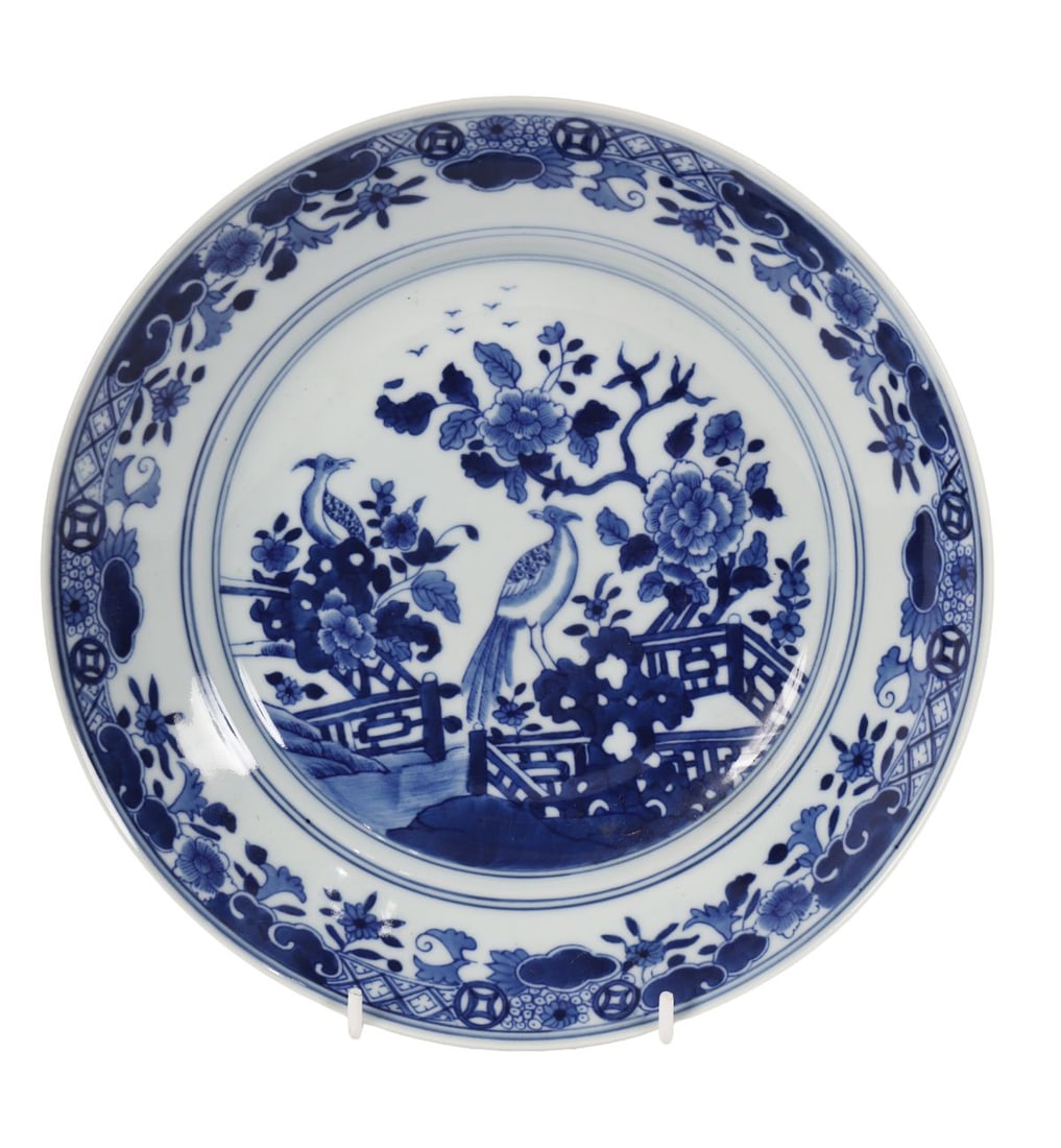 20TH - CENTURY CHINESE BLUE AND WHITE DISH: Of large shallow form, painted in bold underglaze blue with stylised birds amongst flowering branches in a free and expressive manner. CHINESE