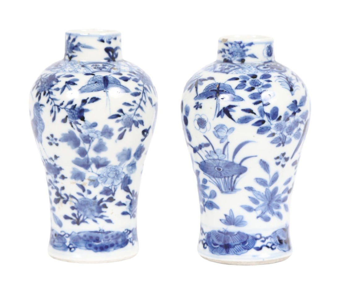 PR CHINESE QING BLUE AND WHITE MEIPING VASES: Pair of Chinese Qing blue and white meiping vases, each decorated with birds amongst flowering branches and foliage. CHINESE